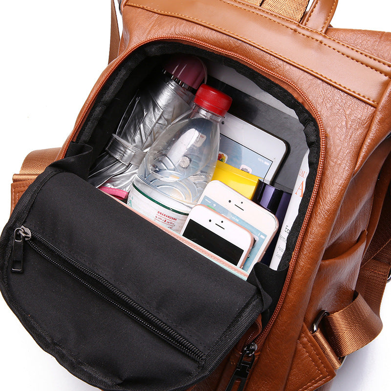 Interior de la Mochila Guarda en marrón abierta, foto real del fabricante