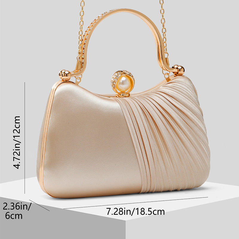 Clutch Perla · foto real del proveedor
