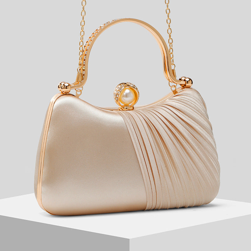 Clutch Perla · foto real del proveedor