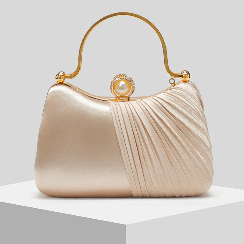 Clutch Perla · foto real del proveedor