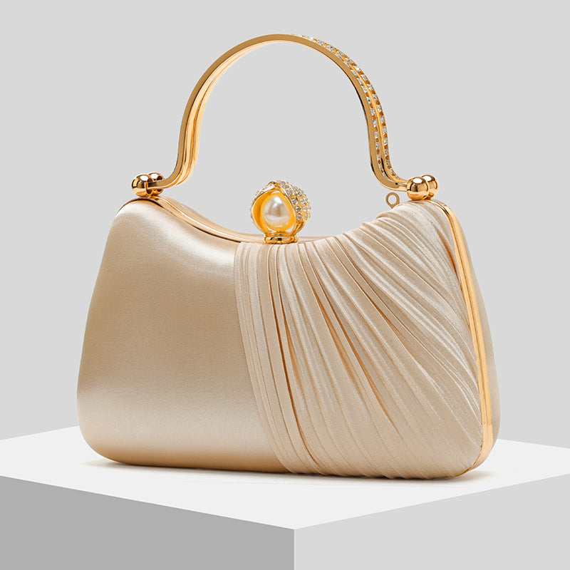 Clutch Perla · foto real del proveedor
